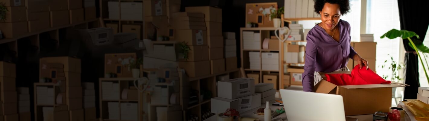 A business woman wrapping a package for export.