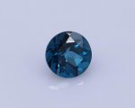 London Blue Topaz Faceted Gemstone in Round Shape